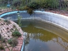Old and dirty fibreglass pool
